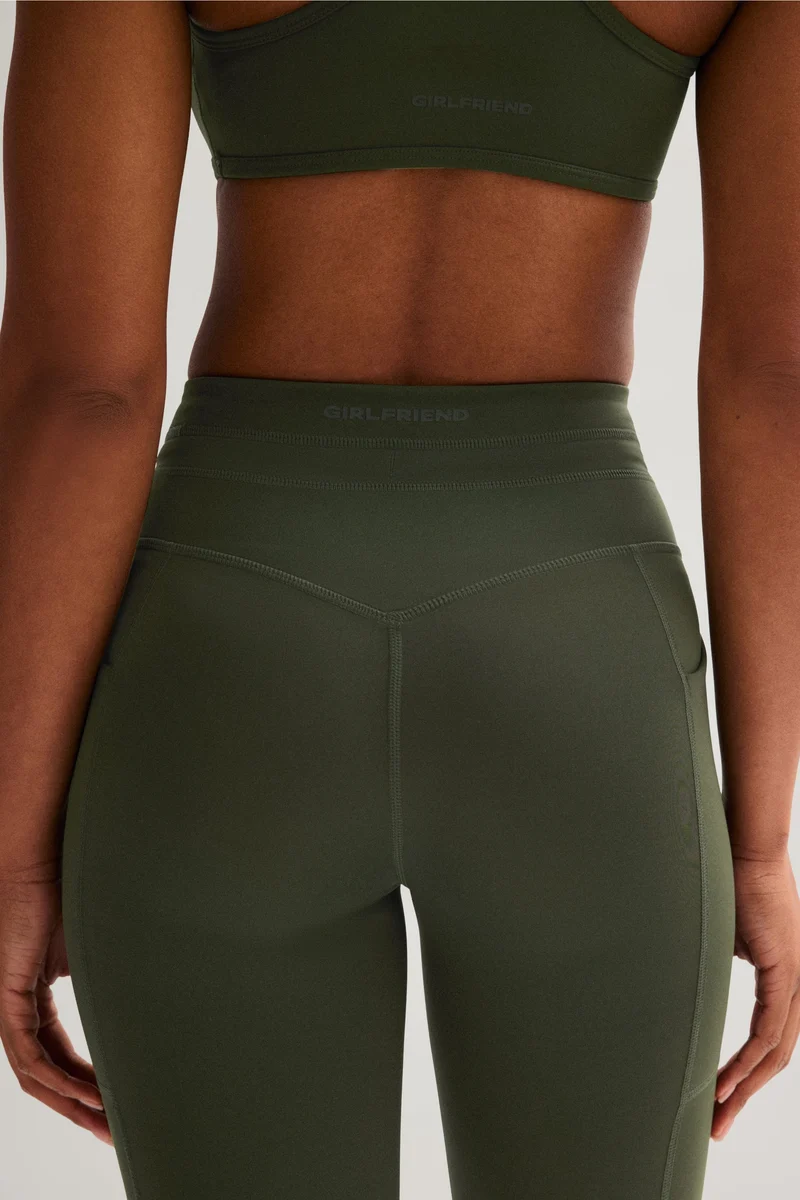 Legging de compression à cordon et poche plaquée