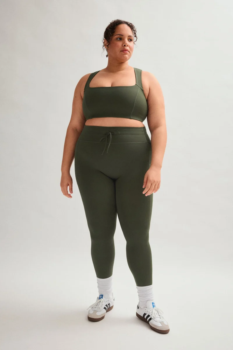 Legging de compression à cordon et poche plaquée