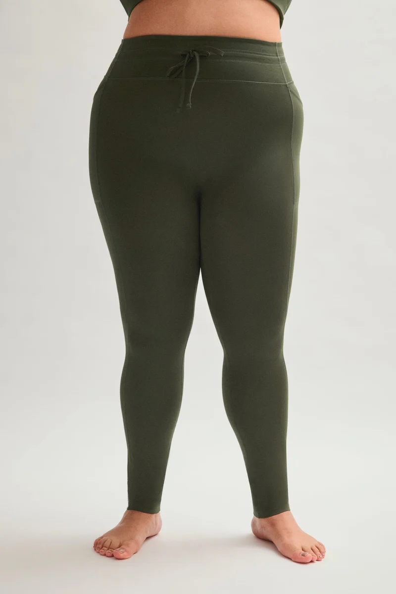 Legging de compression à cordon et poche plaquée
