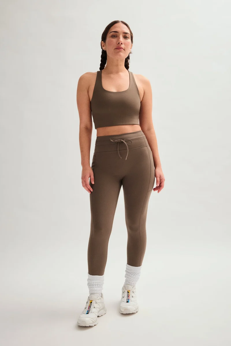 Legging de compression à poches et cordon de serrage