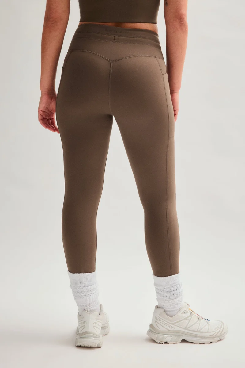 Legging de compression à poches et cordon de serrage