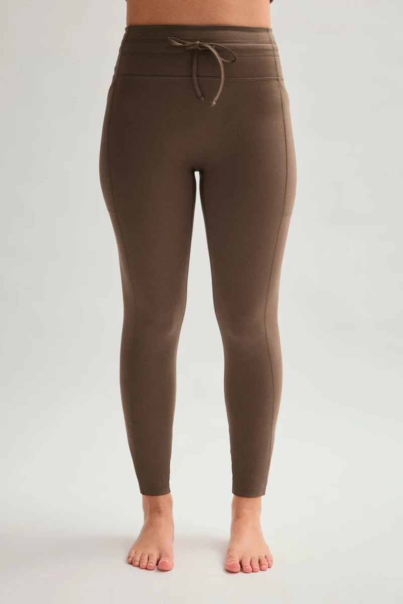 Legging de compression à poches et cordon de serrage