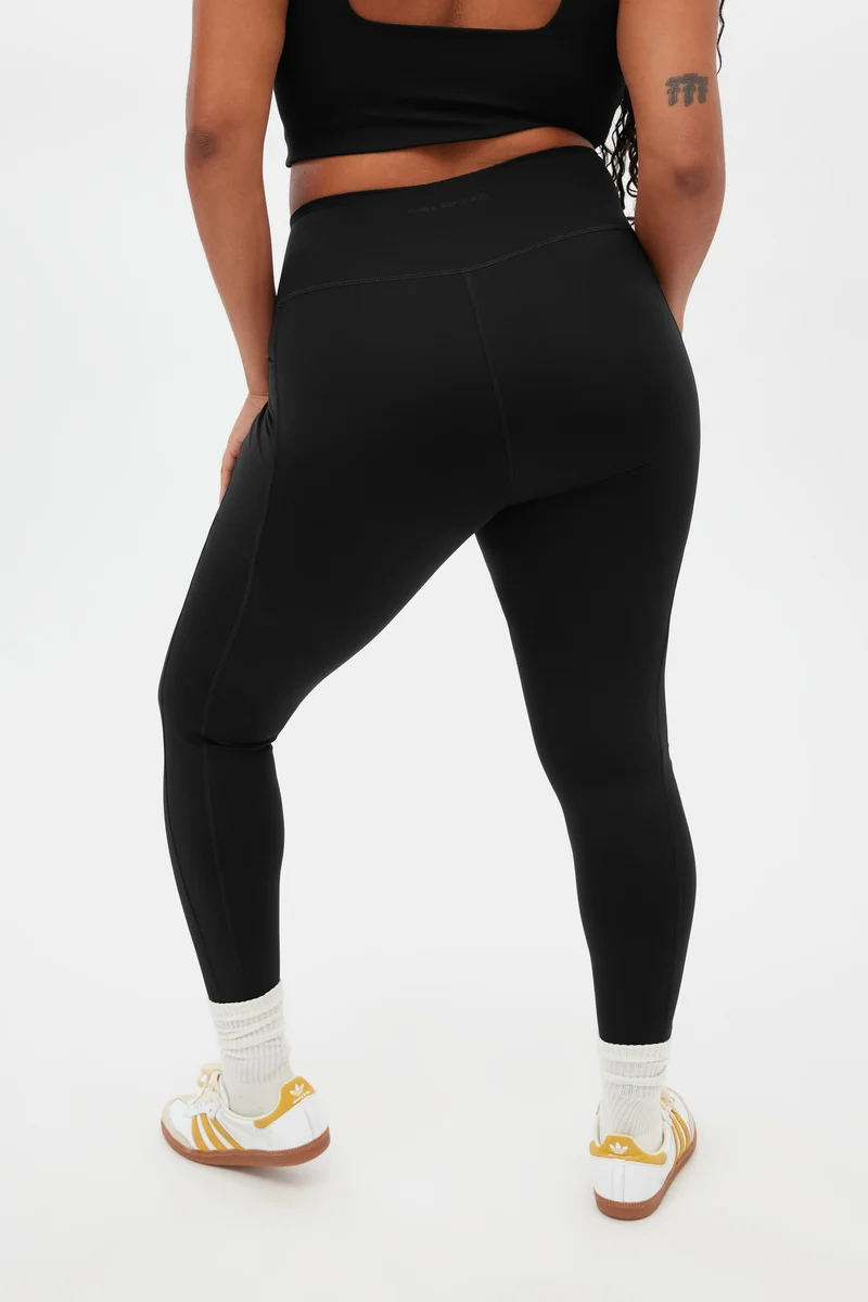 Legging de compression noir à poche