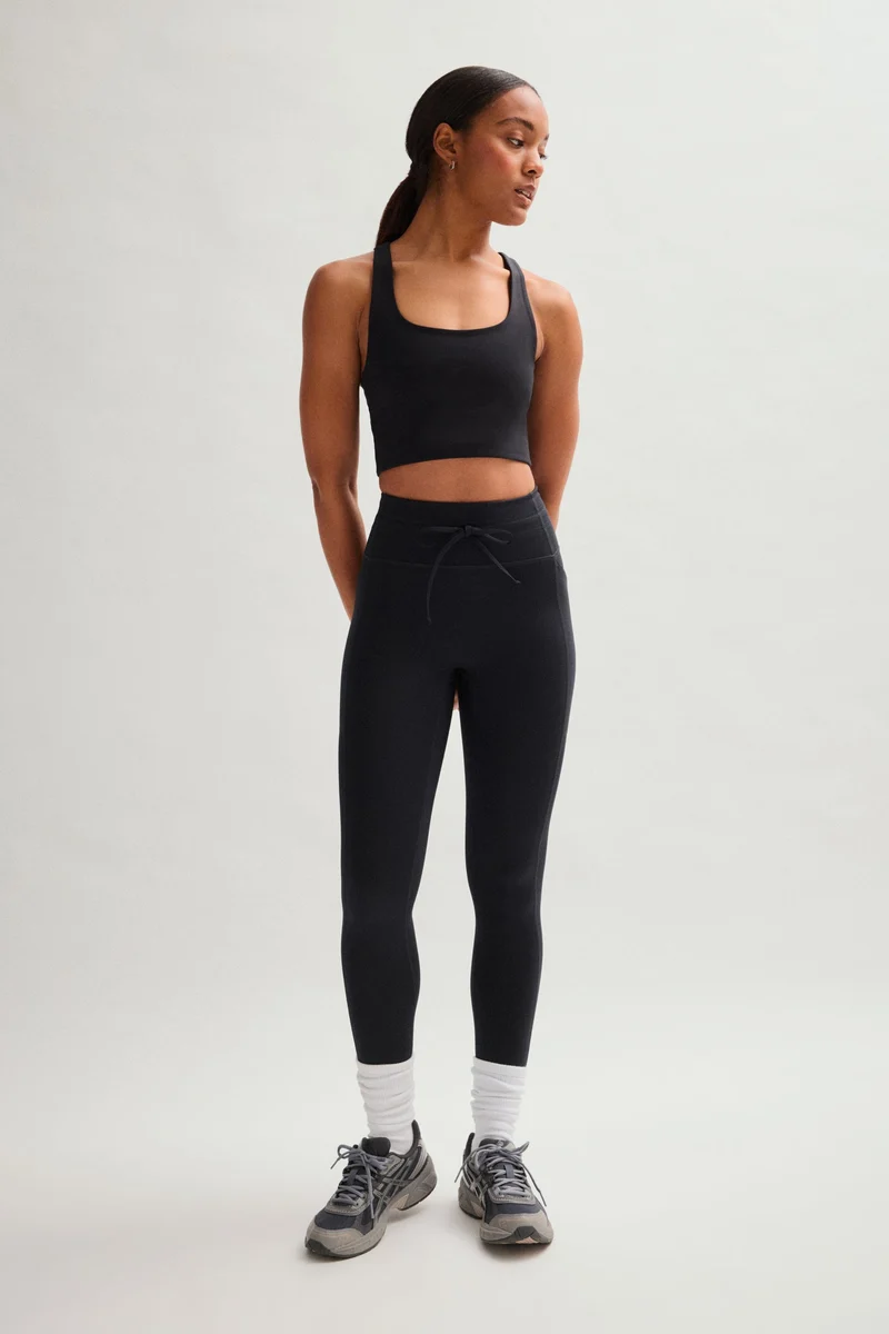 Legging noir compressif avec cordon de serrage et poches