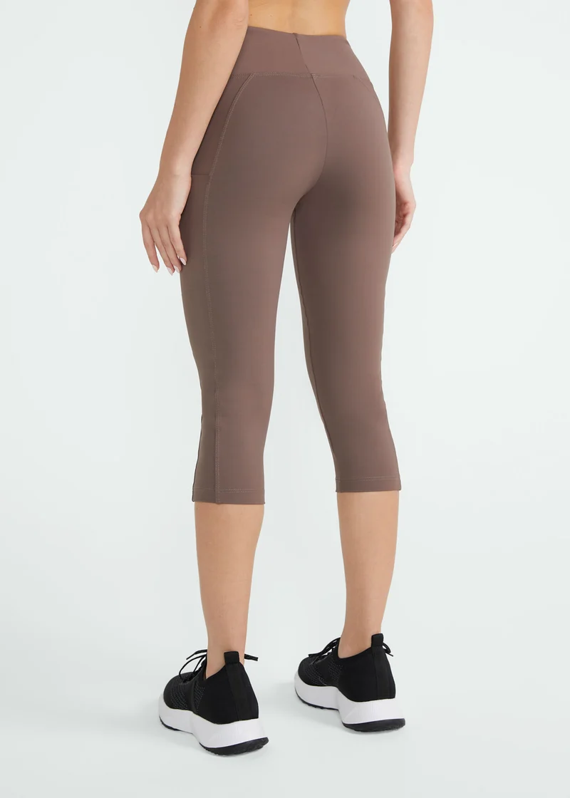 Calça Legging Mulher 3/4 Bolsos
