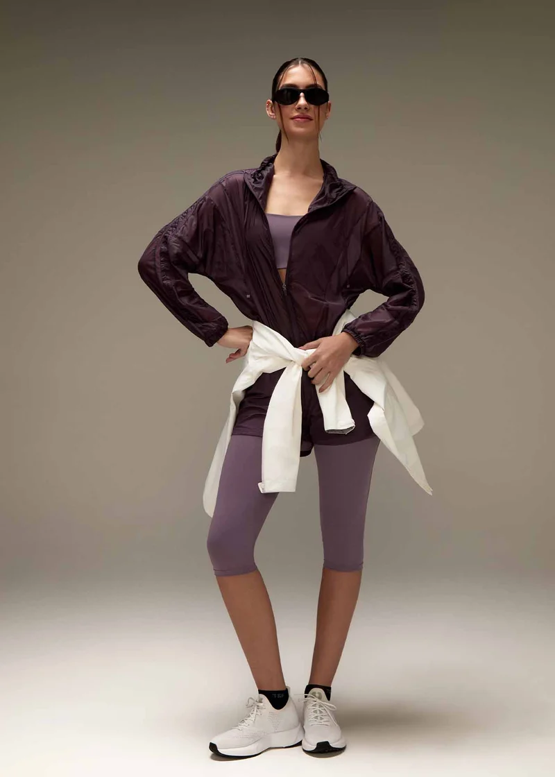 Calça Legging Mulher 3/4 Bolsos