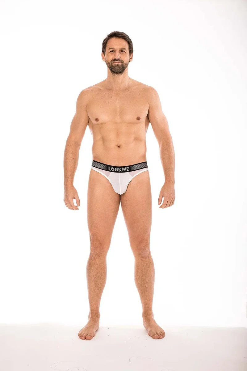 slip homme sexy string blanc large ceinture élastique siglé mélange tissu opaque résille transparente coupe tendance confortable polyamide elasthanne échancré