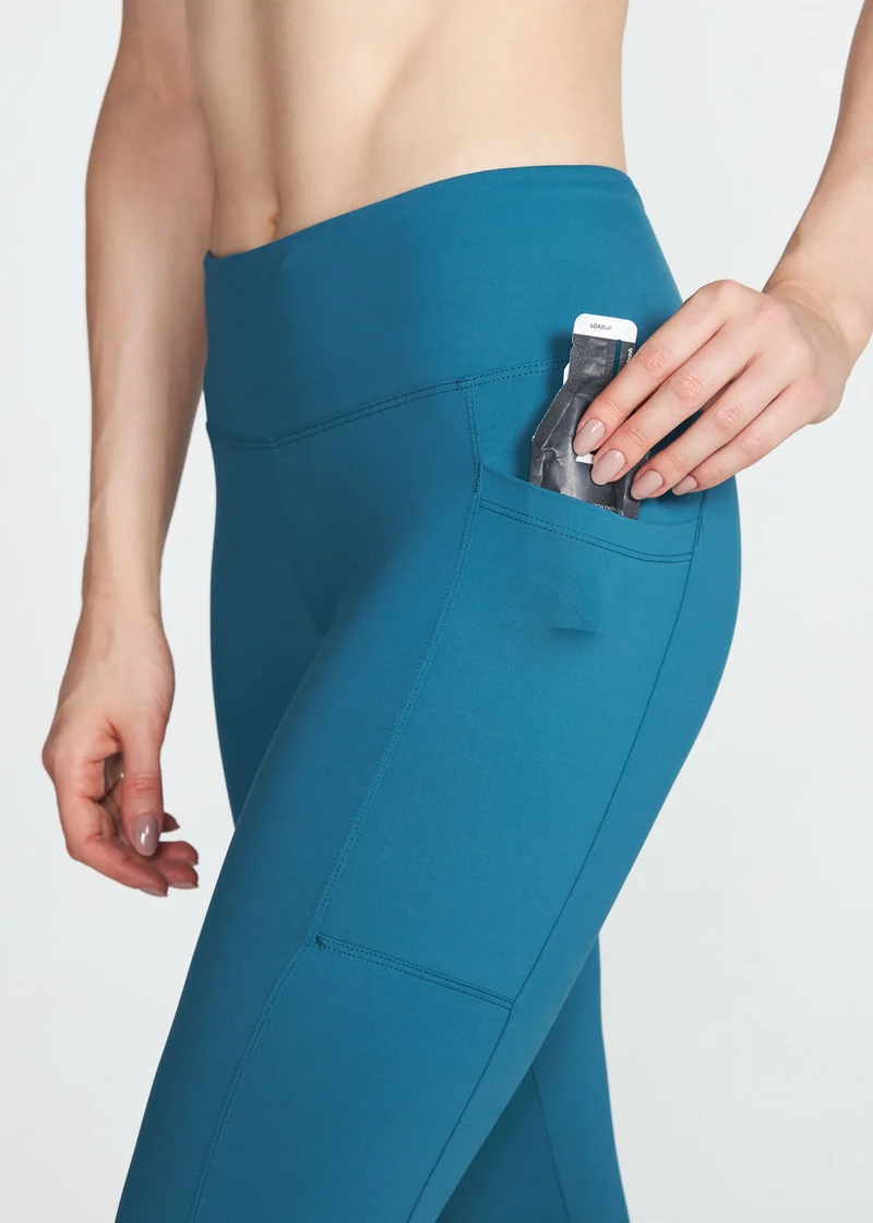 Calça Legging Mulher Bolsos