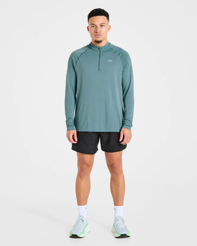 Attain Seamless 1/2 Zip Pullover - Titan Bleu