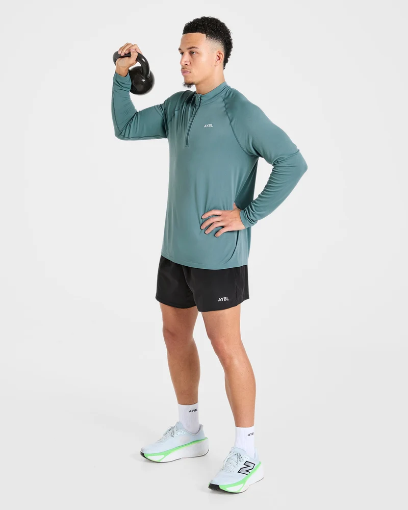 Attain Seamless 1/2 Zip Pullover - Titan Bleu