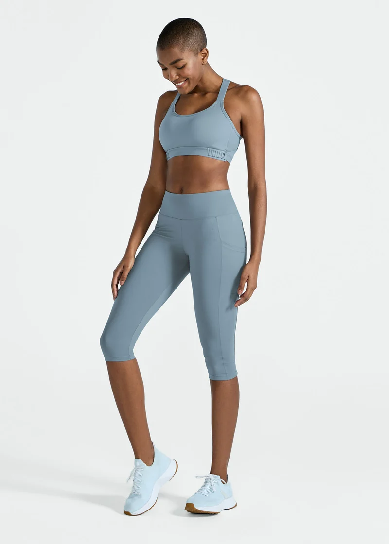 Calça Legging Mulher 3/4 Bolsos