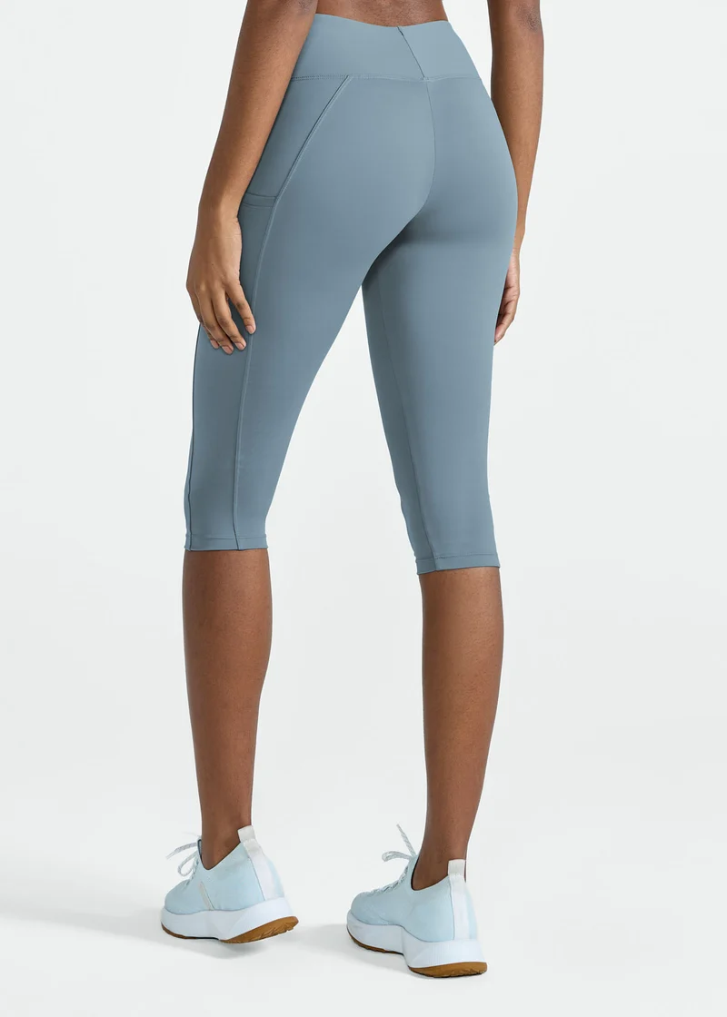 Calça Legging Mulher 3/4 Bolsos