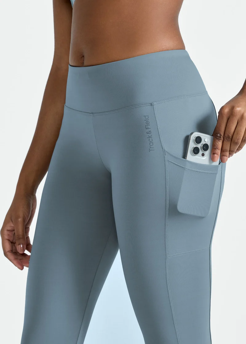 Calça Legging Mulher 3/4 Bolsos