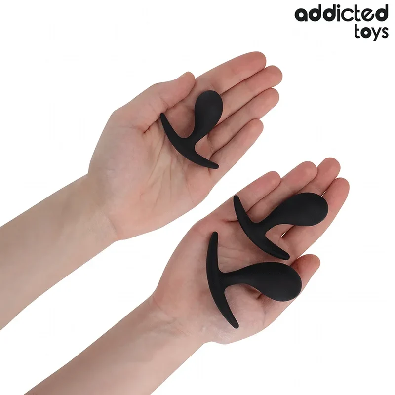 ensemble trois bouchons anaux silicone médical hypoallergénique progressifs ergonomique base élargie texture lisse noir discret coffret élégant débutant expérimenté