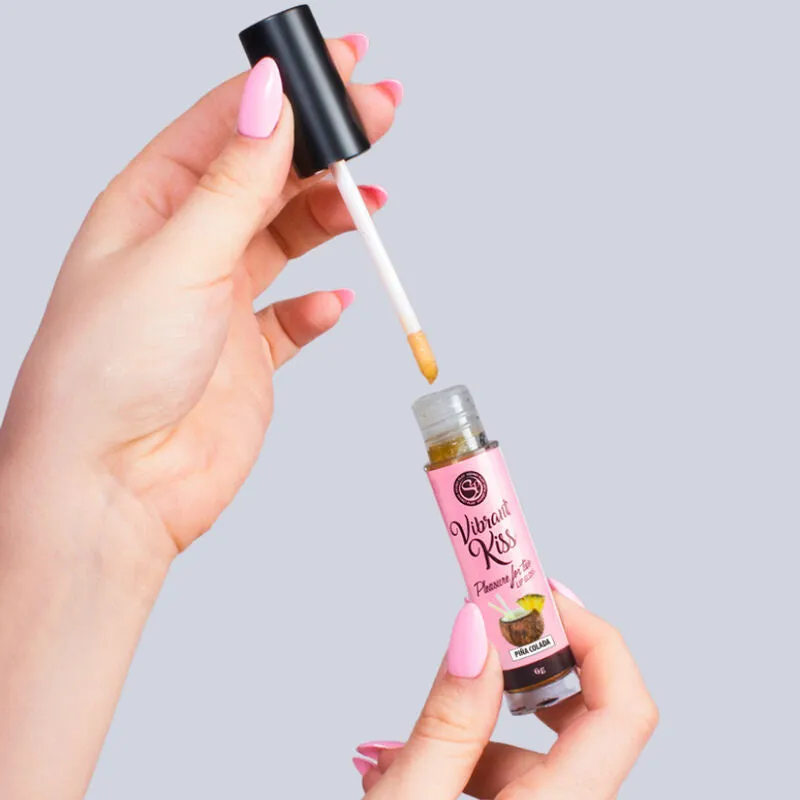 gloss lèvres vibrant aphrodisiaque exotique ananas coco doré brillant sensoriel vibratoire intime couple élégant discret applicateur mousse précis durable
