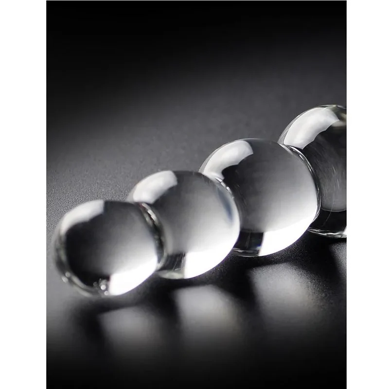massageur verre soufflé hypoallergénique stimulation anale progressive sphères graduées insertion confortable surface lisse transparent chauffable refroidissable durable hygiénique discret élégant