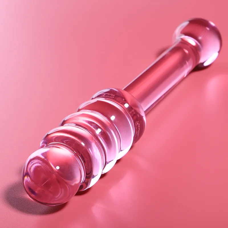 Plug anal verre borosilicate design épuré sextoy haut gamme hypoallergénique non poreux annelé allongé ergonomique thermique lisse brillant rose translucide