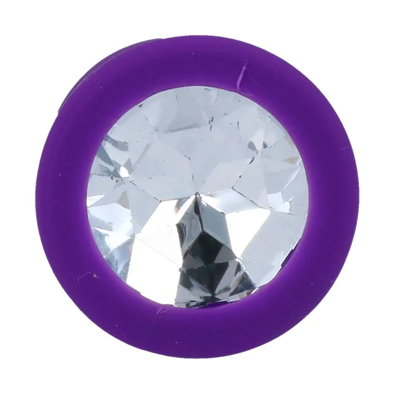 Plug anal silicone médical hypoallergénique doux soyeux ergonomique conique effilé insertion progressive base sécurisée faux diamant transparent lilas