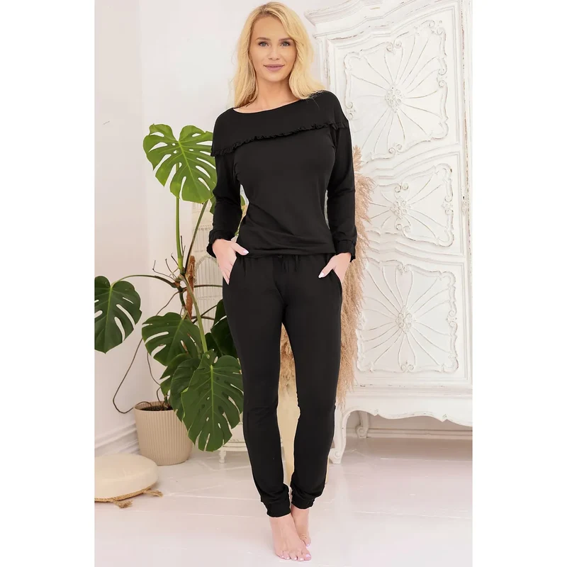 Pyjama Kalimo modèle 219067 élégante confortable noire manches longues ajustables taille élastique cordon serrage poches latérales coton polyester