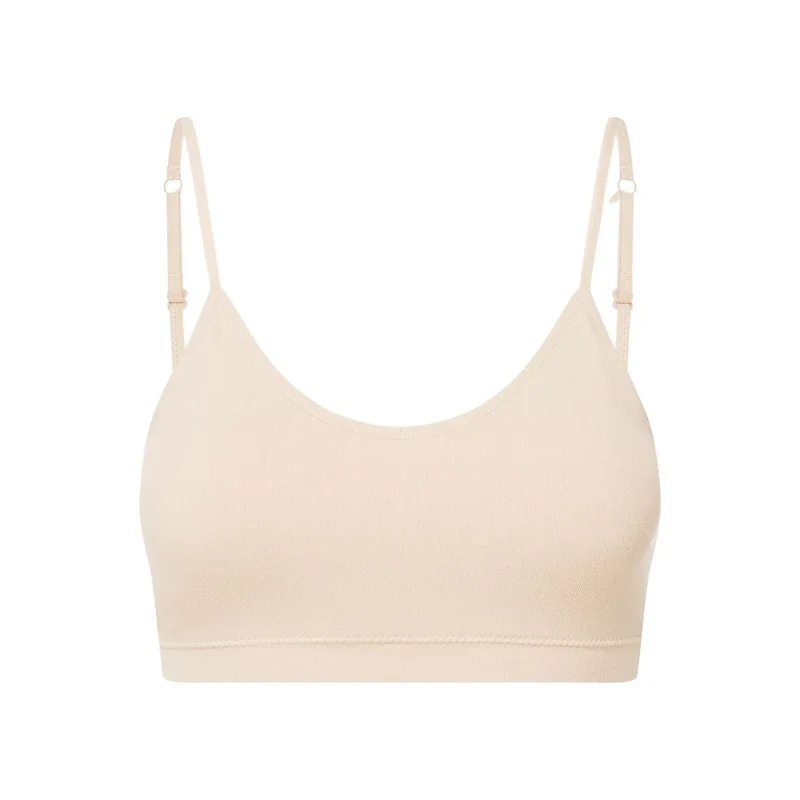 Soutien-gorge moderne sans armatures elastique tissu doux bretelles regulables coussinets amovibles beige lingerie comfortable bien-etre intime