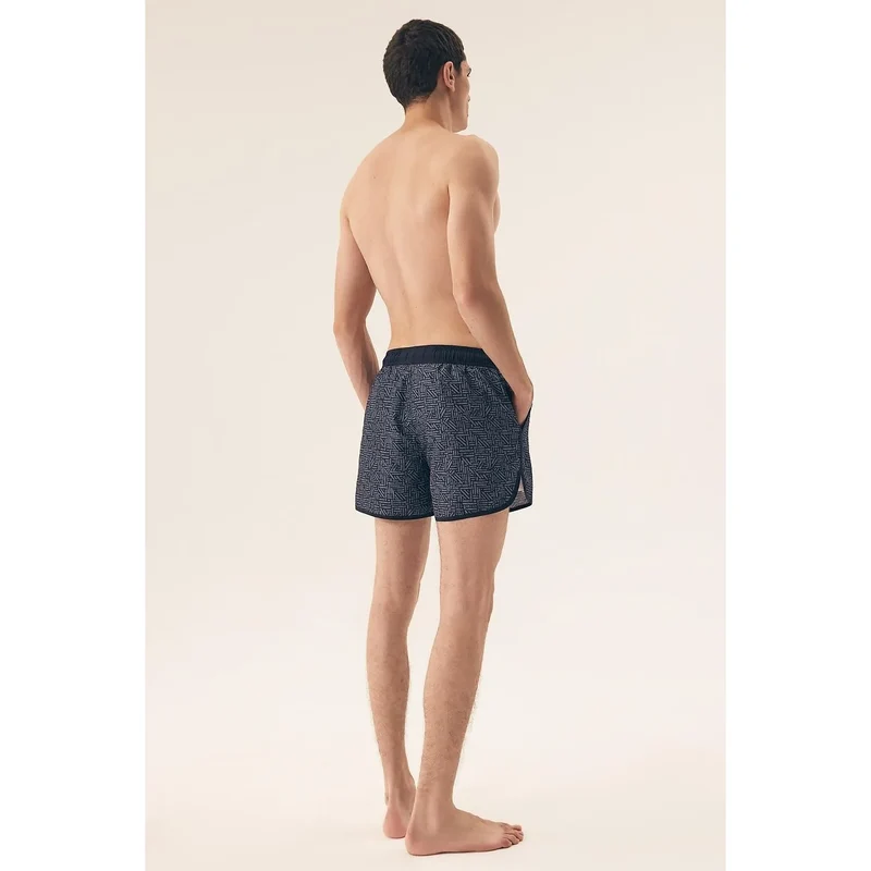 Short de bain homme moderne motif géométrique bleu et noir tissu synthétique séchage rapide plage sport occasionnels confortables fonctionnels