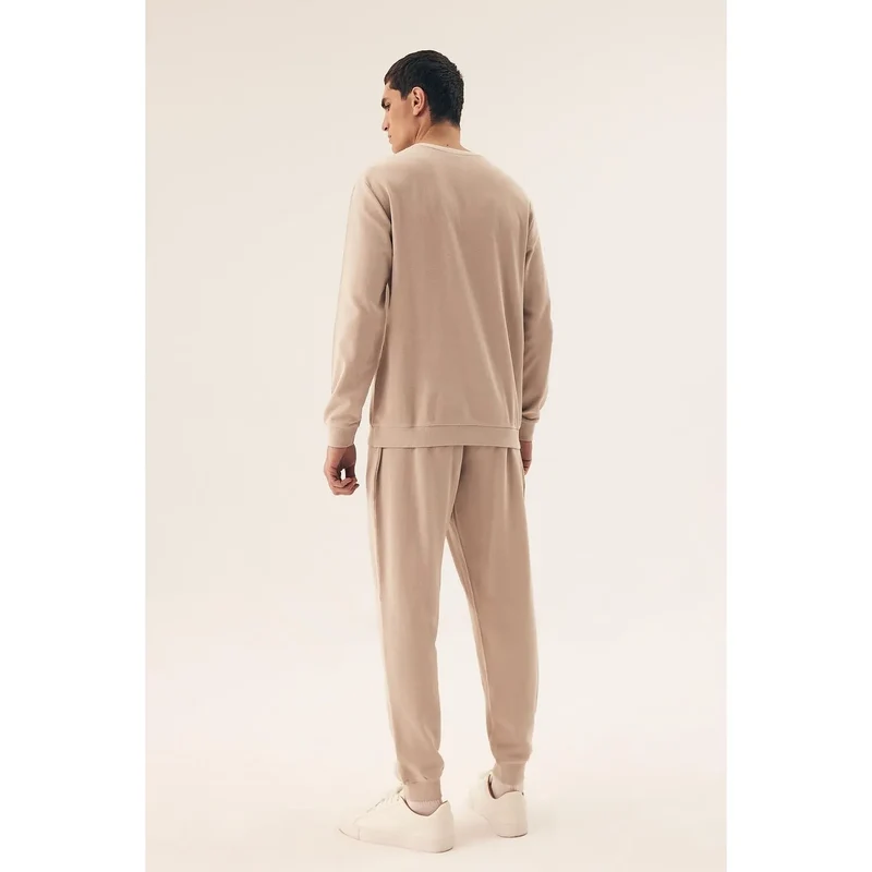 Pyjama homme Henderson modèle 208608 matelassé manches longues pantalon élastique taille cordon poches latérales beige clair confort élégant sophistiqué
